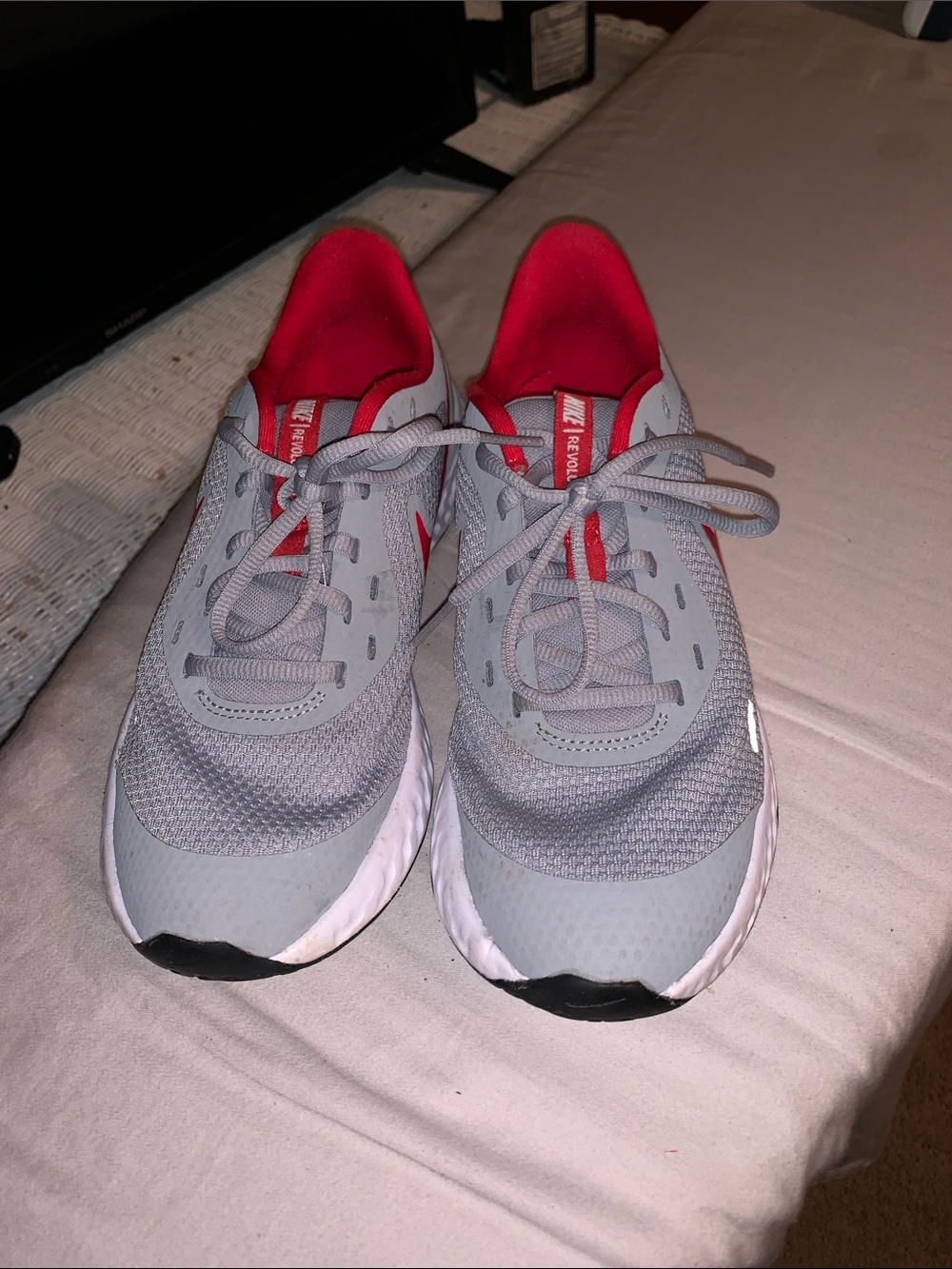 Nike Kids Gray Sneakers with Red Lining